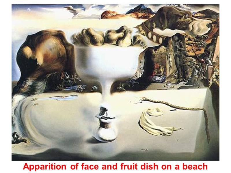 Apparition of face and fruit dish on a beach